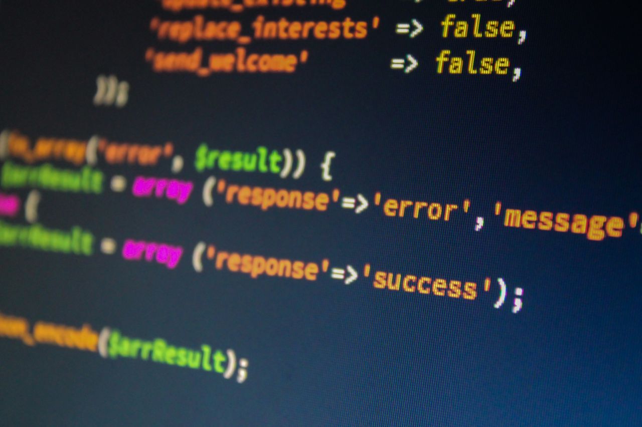 services-01 Close-up of PHP code on a monitor, highlighting development and programming concepts.